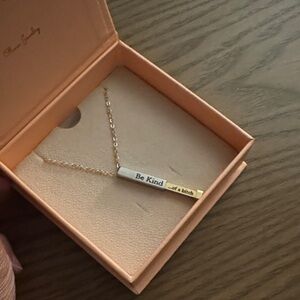 Tongue-in-Chic Gold and Silver Pendant Necklace